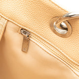The Chanel Caviar Grand Shopping Tote